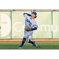 Tulsa Drillers outfielder James Outman makes a throw back into the infield during Wednesday's game with Wichita