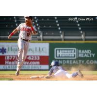 New York Boulders Jack Sundberg slides safely into second base with a stolen base against the New Jersey Jackals