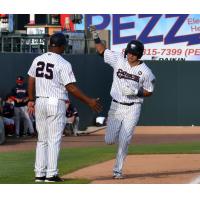 Chad Bell of the Somerset Patriots rounds the bases after his home run