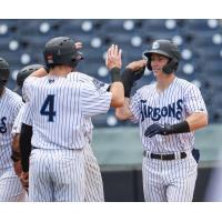 Trey Sweeney congratulates Cooper Bowman after Bowman's grand slam for the Tampa Tarpons