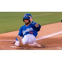 Jacob Amaya slides home with the Tulsa Drillers' only run in Saturday's 4-1 loss to Northwest Arkansas