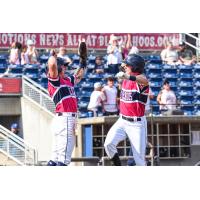 Griffin Conine of the Pensacola Blue Wahoos celebrates a homer