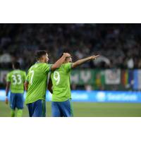 Cristian Roldan and Raúl Ruidíaz of Seattle Sounders FC