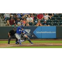 Michael Busch makes contact with a pitch as the Tulsa Drillers take game four of the series 2-1