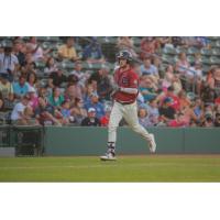 Casey Gillaspie of the Kansas City Monarchs Trots home against the Houston Apollos