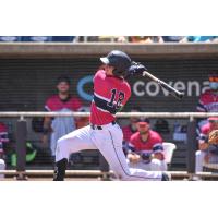 Griffin Conine of the Pensacola Blue Wahoos follows through on his swing