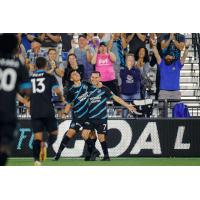 Colorado Springs Switchbacks FC celebrate with José Torres (right) after his goal