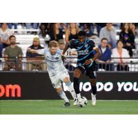 Colorado Springs Switchbacks FC midfielder Andre Lewis (right) vs. El Paso Locomotive FC