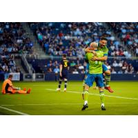 Seattle Sounders FC react after a goal against Sporting Kansas City