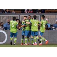 Seattle Sounders FC celebrate a goal against the San Jose Earthquakes