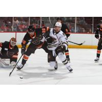 Lehigh Valley Phantoms defenseman Wyatte Wylie (left) vs. the Hershey Bears