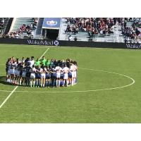 North Carolina Courage and NJ/NY Gotham FC gather at midfield