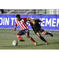 Atlético Ottawa midfielder Zachary Verhoven (left) vs. Valour FC