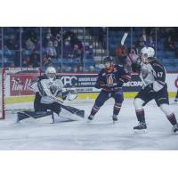 Vancouver Giants goaltender Will Gurski tries to fend off the Kamloops Blazers