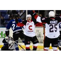 Prince George Cougars celebrate a goal against the Victoria Royals