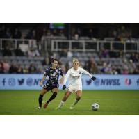 NJ/NY Gotham FC midfielder Allie Long (right) vs. Racing Louisville FC