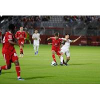 Phoenix Rising FC forward Arturo Rodriguez takes the ball from Tacoma Defiance