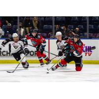Kelowna Rockets battle the Vancouver Giants