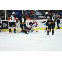 Vancouver Giants Ty Thorpe (left) and Fabian Leslie attack the Prince George Cougars
