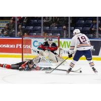 Kelowna Rockets goaltender Talyn Boyko faces a Kamloops Blazers shooter