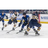 Saint John Sea Dogs centre Josh Lawrence handles the puck vs. the Shawinigan Cataractes