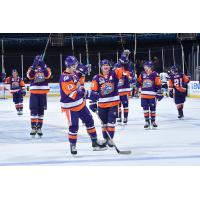 Orlando Solar Bears salute the fans as they head off the ice