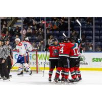 Kelowna Rockets celebrate a goal against the Spokane Chiefs
