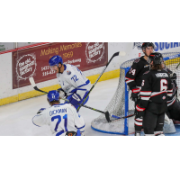 Peter Crinella of the Wichita Thunder reacts after a goal as teammate Jay Dickman approaches