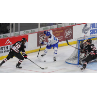 Wichita Thunder forward Matteo Gennaro (center) vs. the Rapid City Rush