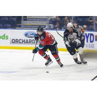 Vancouver Giants centre Ty Thorpe (right) vs. Kelowna Rockets centre Nolan Flamand