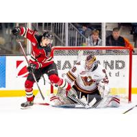 Red Deer Rebels centre Kalan Lind vs. the Calgary Hitmen goaltender