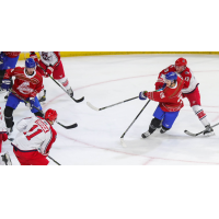Wichita Thunder forward Brayden Watts pushes the puck against the Allen Americans