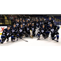 Victoria Royals pose with the Lighthouse Island Bowl Trophy after beating the Vancouver Giants