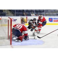 Medicine Hat Tigers left wing Tyler MacKenzie prepares to shoot against the Lethbridge Hurricanes
