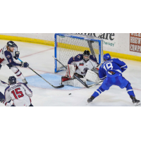 Wichita Thunder forward Carter Johnson (right) vs. the Tulsa Oilers