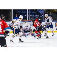 Kelowna Rockets pressure the Kamloops Blazers