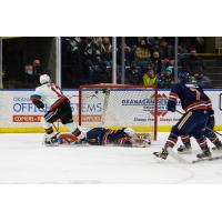 Kelowna Rockets right wing Steel Quiring (left) vs. the Kamloops Blazers
