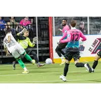 St. Louis Ambush goalkeeper Tito Favela eyes a shot by the Dallas Sidekicks