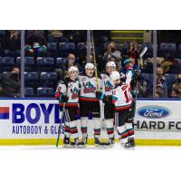 Kelowna Rockets gather following a goal