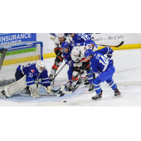 Wichita Thunder goaltender Jake Theut eyes the puck against the Kansas City Mavericks