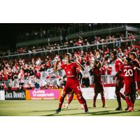 Phoenix Rising FC react after a goal at Wild Horse Pass