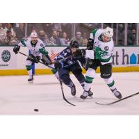 Texas Stars center Rhett Gardner (right) vs. the Manitoba Moose