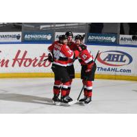 Belleville Senators celebrate a goal against the Rochester Americans