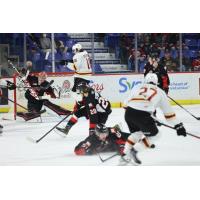 Prince George Cougars goaltender Tyler Brennan scrambles to make a save against the Vancouver Giants