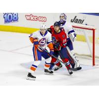 Springfield Thunderbirds center Tanner Kaspick (center) vs. the Bridgeport Islanders