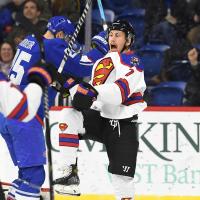 Reading Royals forward Trevor Gooch in the team's Superman jersey