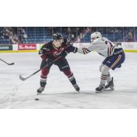 Vancouver Giants right wing Fabian Lysell (left) vs. the Kamloops Blazers