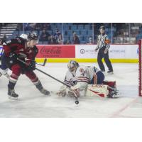 Vancouver Giants left wing Zach Ostapchuk (left) vs. the Kamloops Blazers
