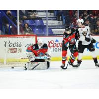Kelowna Rockets goaltender Talyn Boyko eyes a puck against the Vancouver Giants