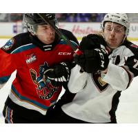 Vancouver Giants defenseman Connor Horning (right) vs. the Kelowna Rockets